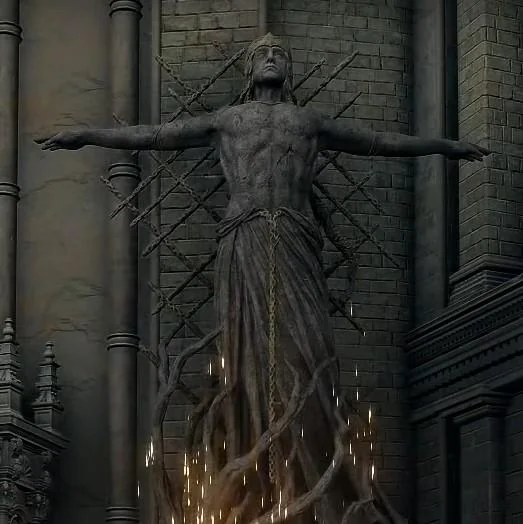 A monumental estátua de pedra de Radagon da Ordem Áurea na capital Leyndell, exibindo a pose clássica com os braços abertos e o padrão de runas cruzadas que sela a Erdtree ao fundo)